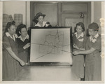 Landscape shot of Nurses with Map of the City of Greensboro by North Carolina A&T State University